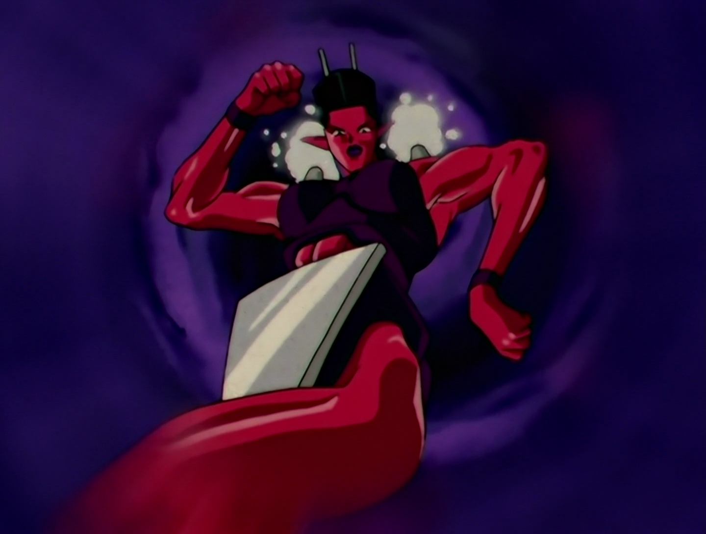 Irondar, a Daimon from Sailor Moon episode 105. She has red skin and black hair in a flat top style. Well, it’s possible that it’s actually a block of plastic, given that she was presumably created from an iron, and there are two metal prongs sticking out like a plug. She has a purple top, a triangular metal plate over her crotch, and what might be metal steam vents on her shoulders. She also has abs. Like, ABS. Oh my, she is so buff. Love that black lipstick too.